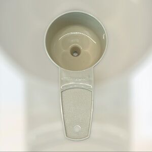 Tupperware beige mini funnel/egg separator